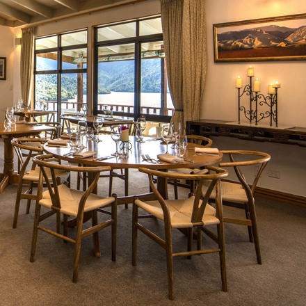 Dining at the Punga Fern Restaurant can be indoor or outdoor with seating available for each preference and surrounding views of Punga Cove and Endeavour Inlet in the Marlborough Sounds of New Zealand