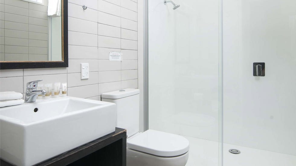 An Endeavour Suite ensuite has its own shower and toilet at Furneaux Lodge in the Marlborough Sounds at the top of New Zealand's South Island.