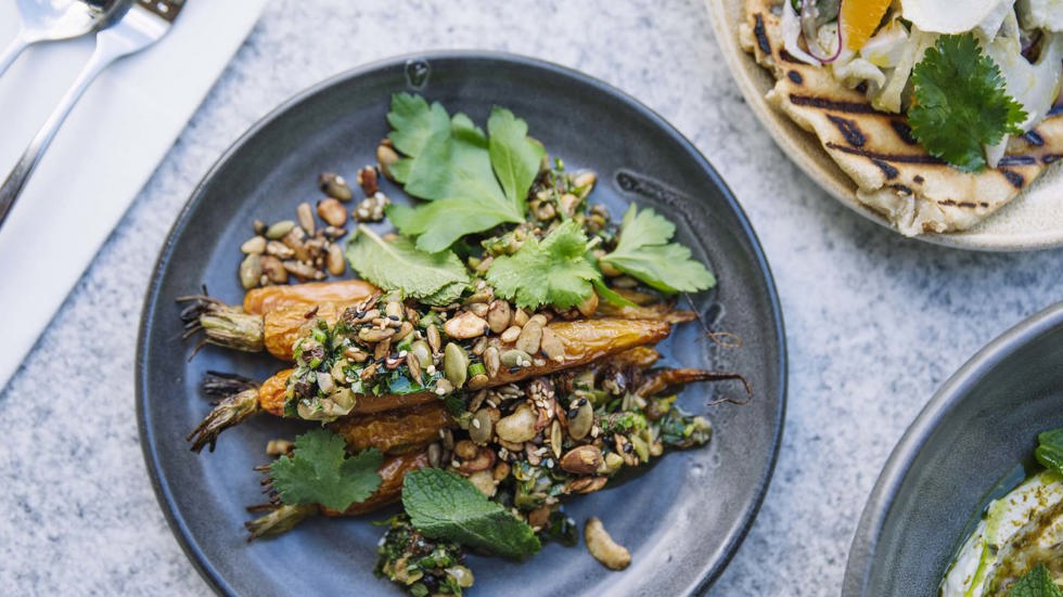 A gourmet roasted carrots sharing plate Furneaux Lodge Restaurant in the Marlborough Sounds at the top of New Zealand's South Island.