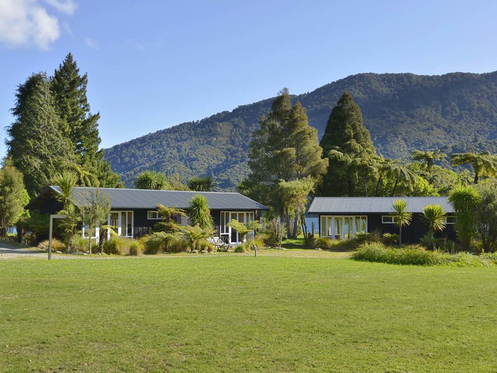 Endeavour Suites can be found close to the water and are surround by lush green native bush at Furneaux Lodge in the Marlborough Sounds at the top of New Zealand's South Island.